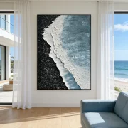 Beach large wall art above a bed in a serene coastal bedroom with light wood furniture